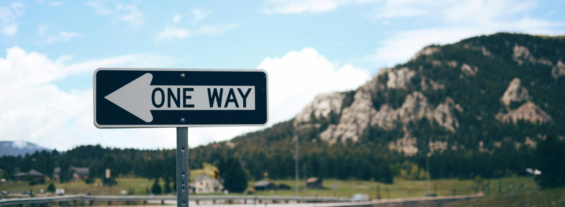 Road Vocabulary: A road sign saying "One Way."